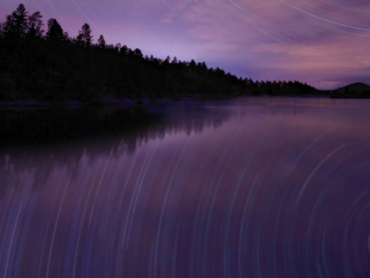 Lake surrounded by trees with star trails - Ideal for Canvas TV - Enhance your decor with free art