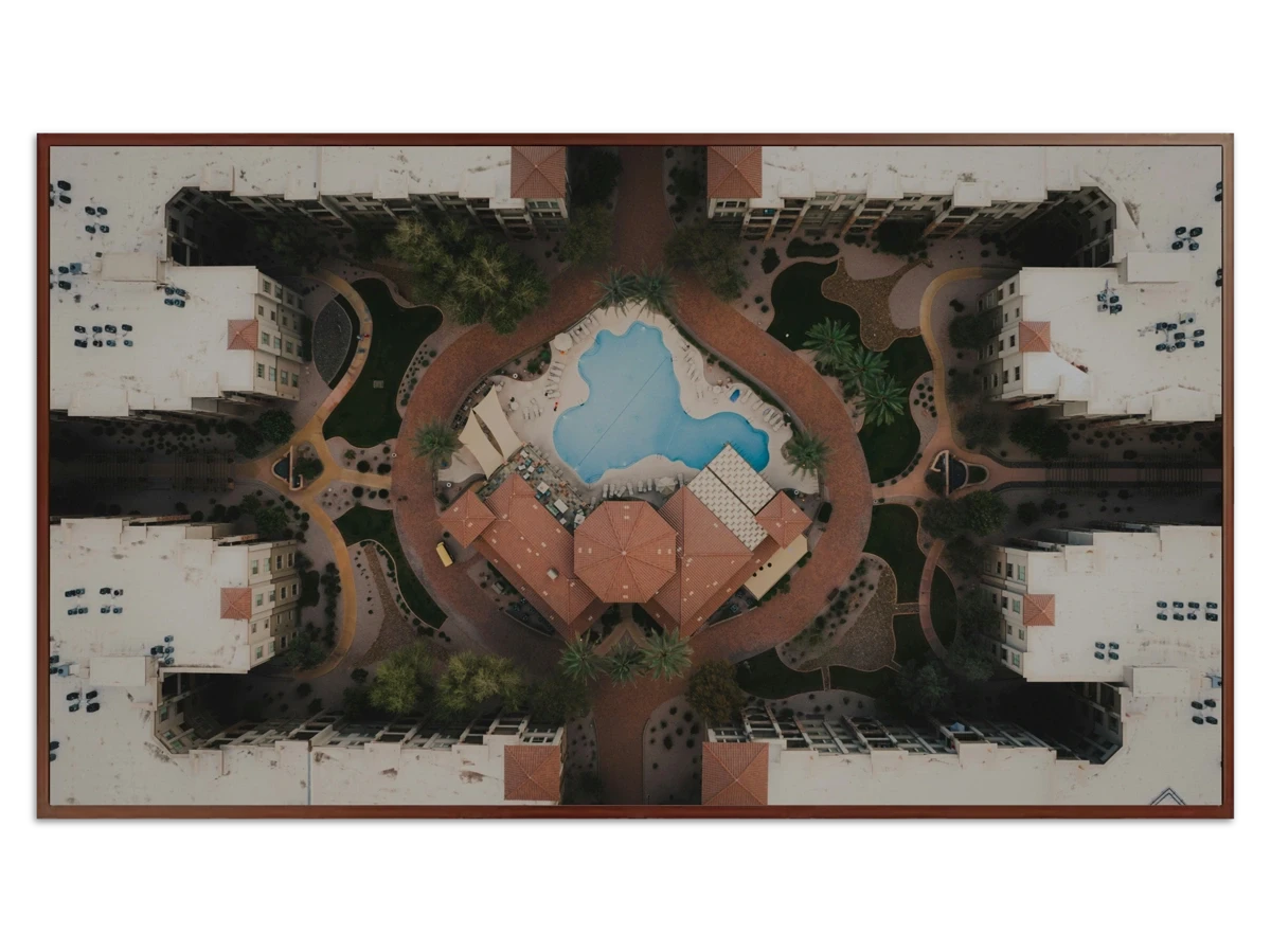 Aerial view of a building with a pool - Free art for Frame TV