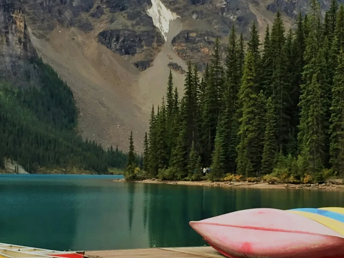 Canoes at Lake Moraine - Ideal for Canvas TV - Enhance your decor with free art